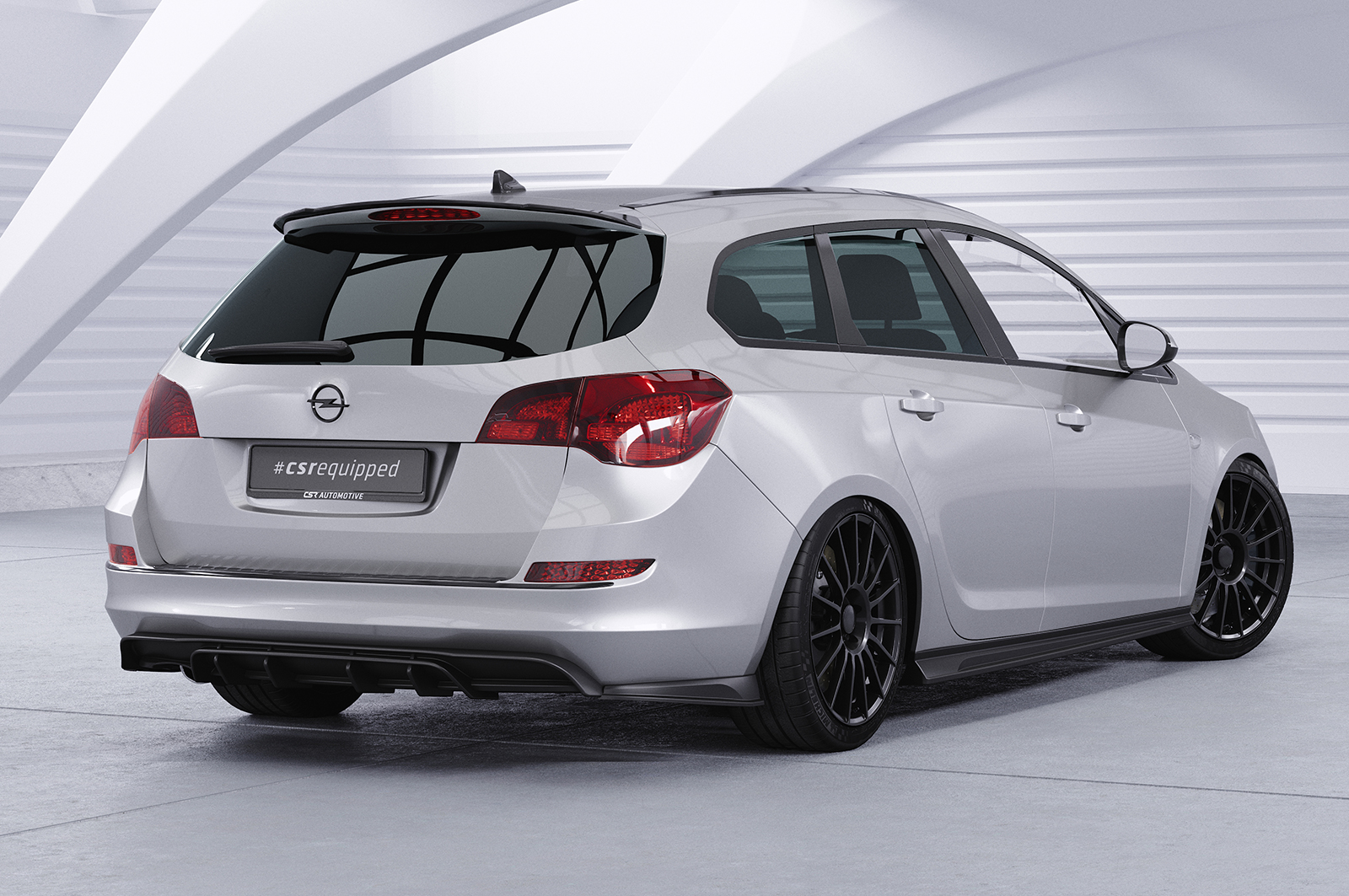 Becquet / Extension CAP pour Opel Astra J Sports Tourer (11/2010-09/2015) - Fabriqué en ABS (6 finitions au choix)