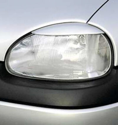 Paupières de phares avants (la paire) pour Opel Corsa B hatchback (1993-2000) - Fabriqué en ABS (à peindre)