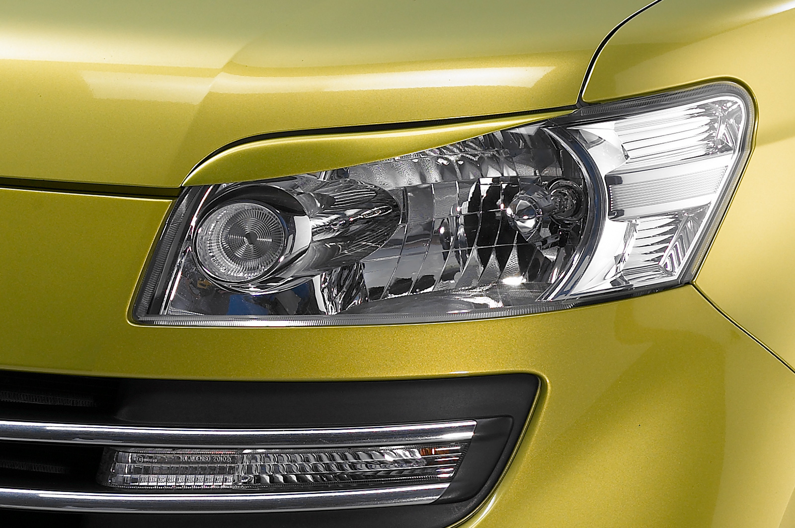 Paupières de phares avants (la paire) pour Daihatsu Materia Typ M4 hatchback (depuis 2006) - Fabriqué en ABS (à peindre)
