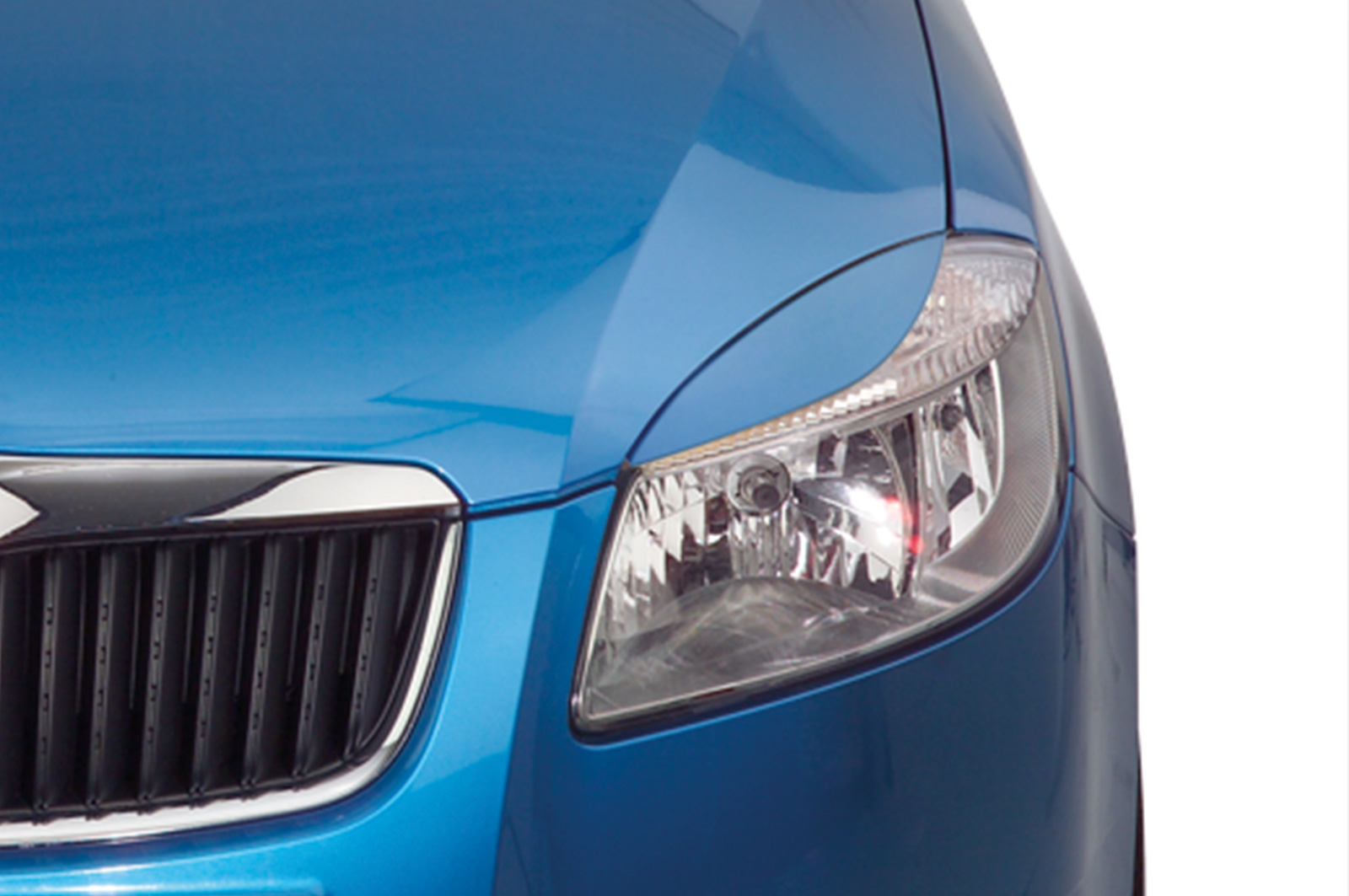 Paupières de phares avants (la paire) pour Skoda Roomster Typ 5J hatchback (2006-03/2010) - Fabriqué en ABS (à peindre)