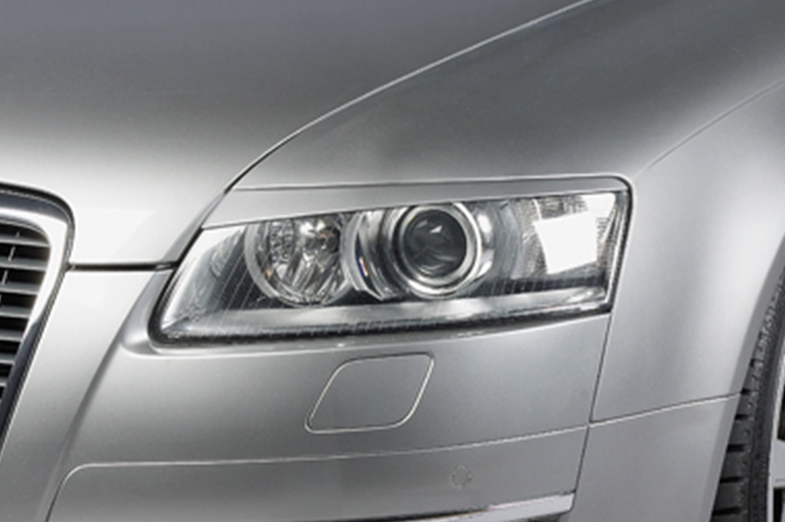 Paupières de phares avants (la paire) pour Audi A6 C6 Typ 4F toutes carrosseries (depuis 2004) - Fabriqué en ABS (à peindre)