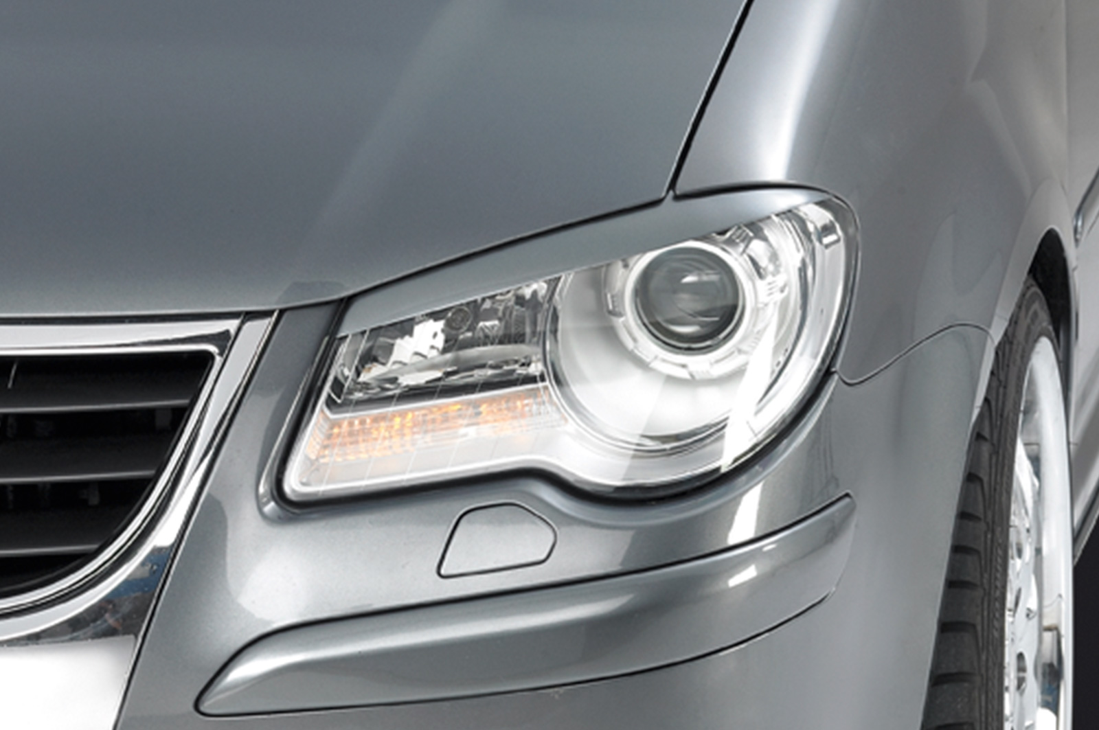 Paupières de phares avants (la paire) pour VW Touran GP toutes carrosseries (2006-2010) - Fabriqué en ABS (à peindre)