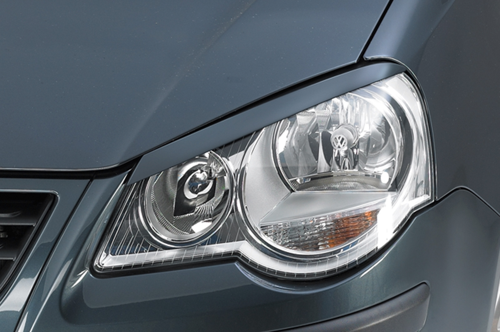 Paupières de phares avants (la paire) pour VW Polo 4 Typ 9N3 hatchback (2005-2009) - Fabriqué en ABS (à peindre)