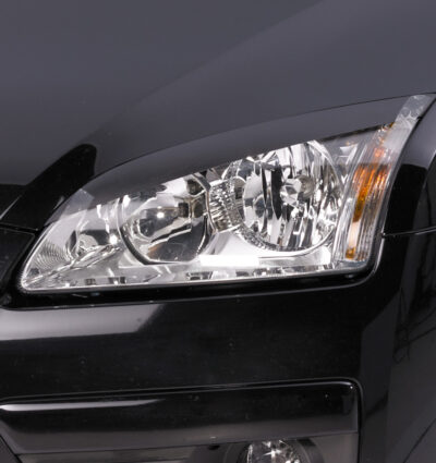 Paupières de phares avants (la paire) pour Ford Focus C307 hatchback / break / cabriolet / berline (2004-2008) - Fabriqué en ABS (à peindre)
