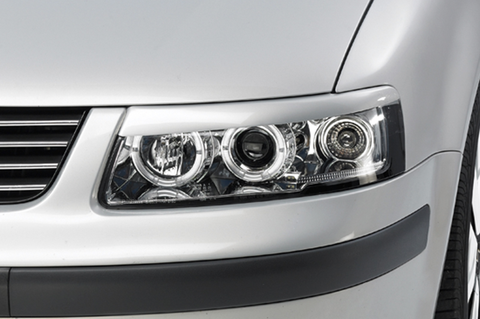 Paupières de phares avants (la paire) pour VW Passat 3B berline / break (1996-2000) - Fabriqué en ABS (à peindre)