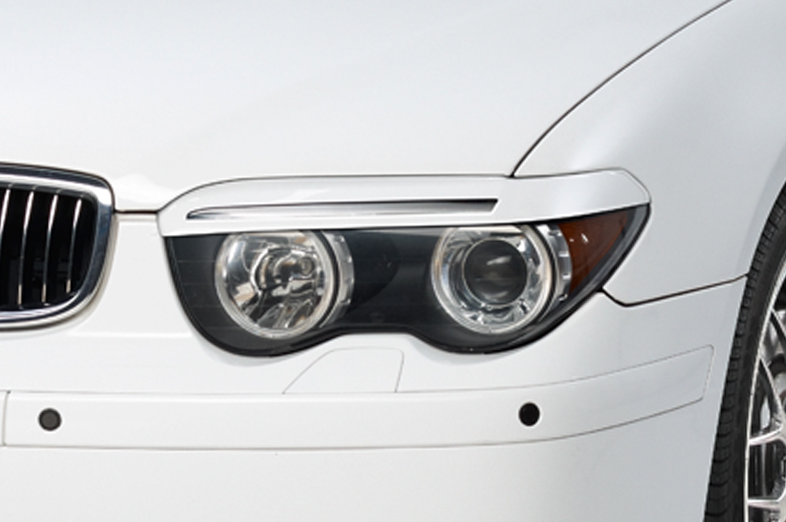 Paupières de phares avants (la paire) pour BMW Série 7 E65 / E66 toutes carrosseries (2001-2005) - Fabriqué en ABS (à peindre)