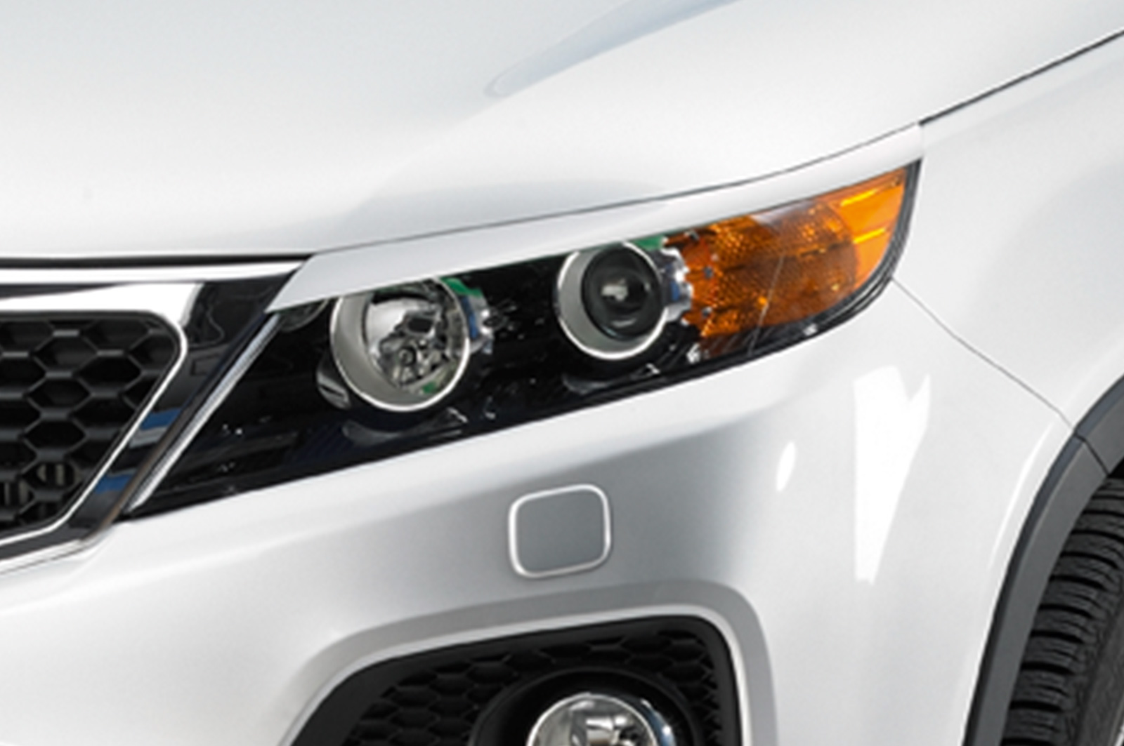 Paupières de phares avants (la paire) pour Kia Sorento (XM) toutes carrosseries (2009-2014) - Fabriqué en ABS (à peindre)