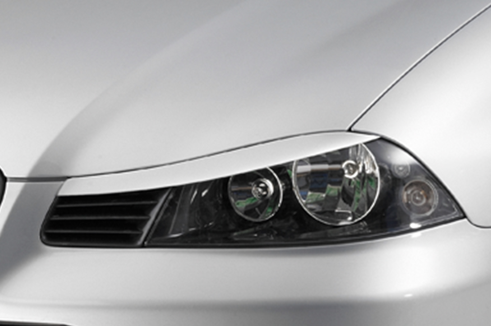 Paupières de phares avants (la paire) pour Seat Ibiza 6L hatchback (2002-2008) - Fabriqué en ABS (à peindre)
