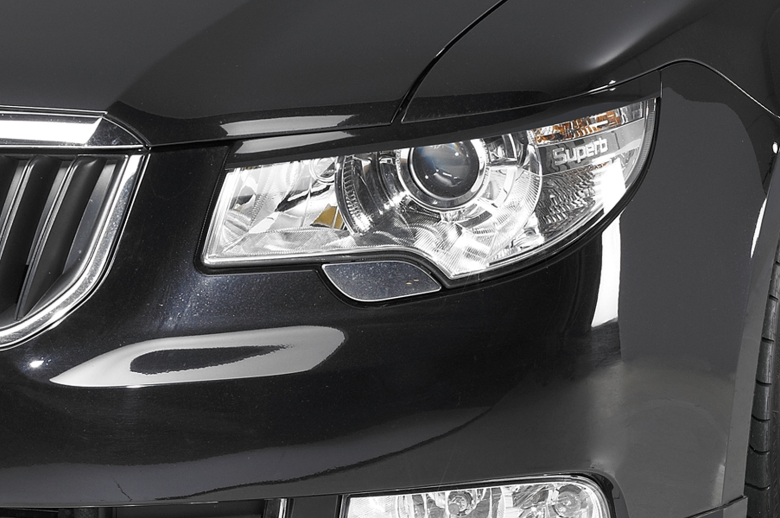 Paupières de phares avants (la paire) pour Skoda Superb II berline / break (2008-06/2013) - Fabriqué en ABS (à peindre)