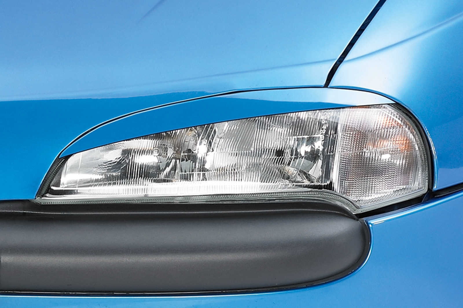 Paupières de phares avants (la paire) pour Opel Tigra A coupé (1994-2000) - Fabriqué en ABS (à peindre)