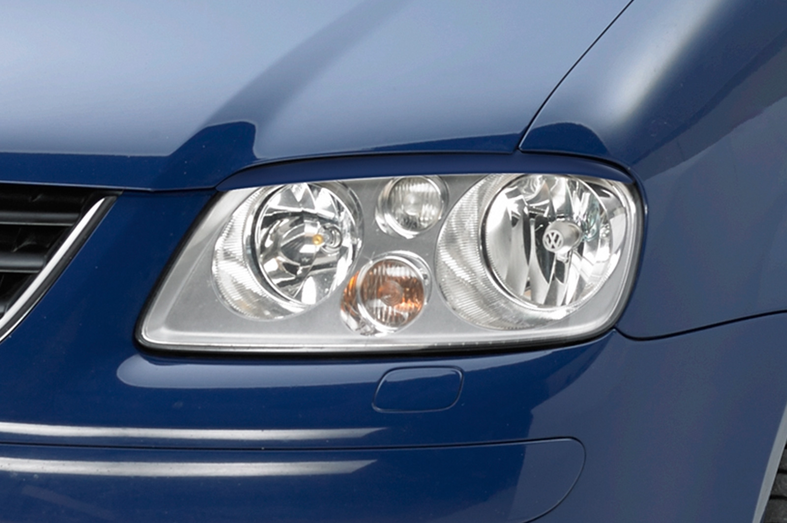 Paupières de phares avants (la paire) pour VW Touran 1T toutes carrosseries (2003-2006) - Fabriqué en ABS (à peindre)