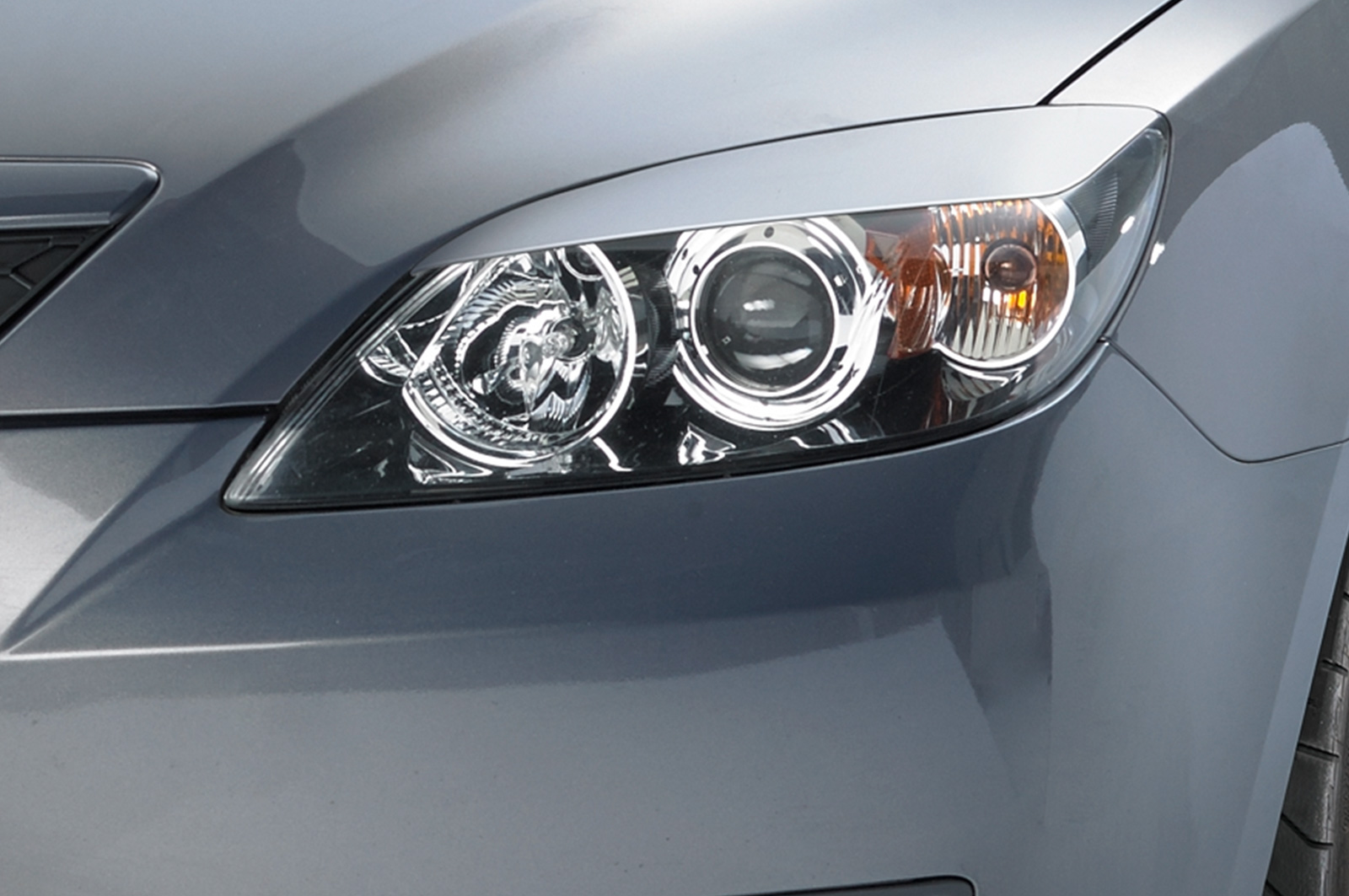 Paupières de phares avants (la paire) pour Mazda 3 toutes carrosseries (2003-2009) - Fabriqué en ABS (à peindre)