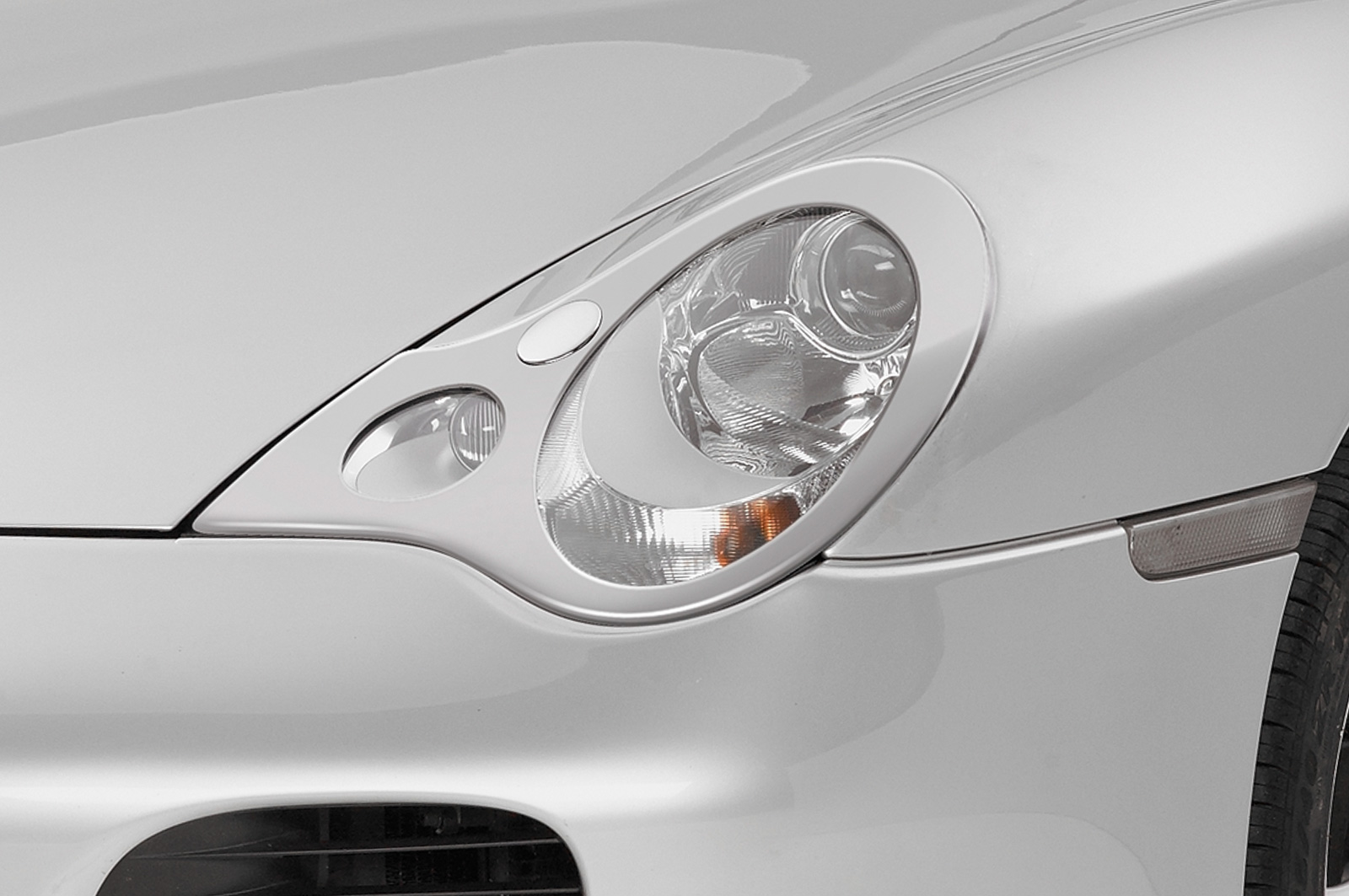 Paupières de phares avants (la paire) pour Porsche 911 / 996 toutes carrosseries (2002-2005) - Fabriqué en ABS (à peindre)