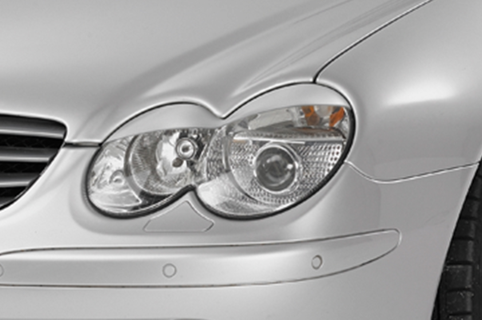 Paupières de phares avants (la paire) pour Mercedes Benz SL R230 toutes carrosseries (2001-2008) - Fabriqué en ABS (à peindre)