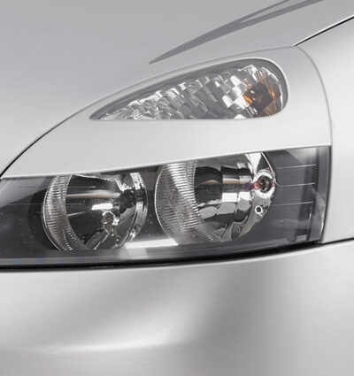 Paupières de phares avants (la paire) pour Renault Clio 2 / B toutes carrosseries (6/2001-2012) - Fabriqué en ABS (à peindre)