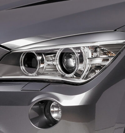 Paupières de phares avants (la paire) pour BMW X1 E84 LCI toutes carrosseries (7/2012-5/2015) - Fabriqué en ABS (à peindre)
