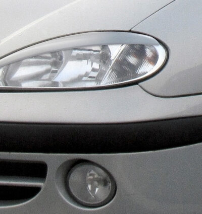 Paupières de phares avants (la paire) pour Renault Megane I Facelift berline / hatchback / cabriolet et break (03/1999-11/2002) - Fabriqué en ABS (à peindre)