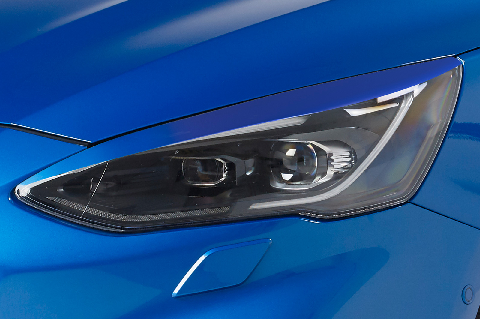 Paupières de phares avants (la paire) pour Ford Focus MK4 toutes carrosseries (depuis 09/2018) - Fabriqué en ABS (à peindre)