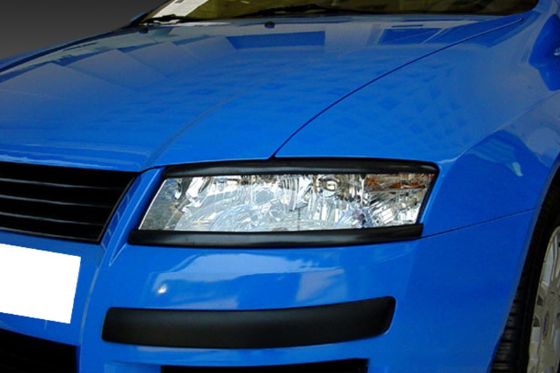 Paupières inférieures de phares (la paire) Fiat Stilo (2001-2007)