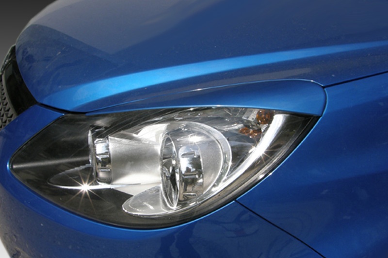 Paupières de phares (la paire) Opel Corsa D (2006-2011)